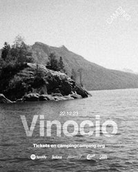 a black and white photo of a lake with the words vinico on it