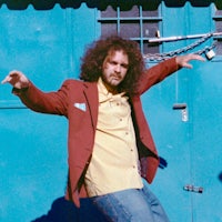 a man with curly hair